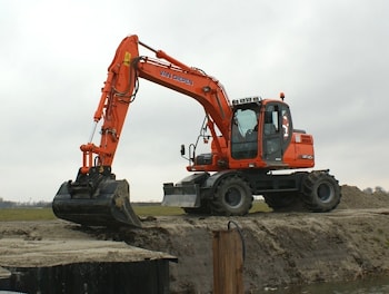 Колесный экскаватор Doosan DX140W экологичен и технологичен  